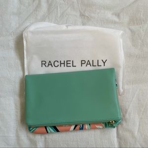 Rachel Pally teal leather foldover clutch with floral design.